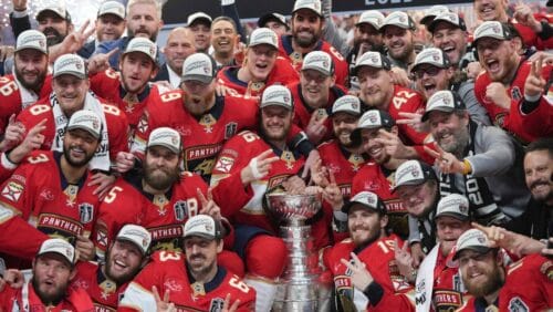 The Florida Panthers team poses with the Stanley Cup trophy after defeating the Edmonton Oilers in Game 6 of the NHL hockey Stanley Cup Final Tuesday, June 17, 2025, in Sunrise, Fla.
