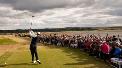 Tiger Woods of the US plays from the 12th tee during the first round of the British Open golf championship on the Old Course.