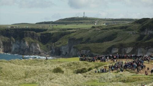 Golfers play from the 7th hole during the third round of the British Open Golf Championships at Royal Portrush in Northern Ireland, Saturday, July 20, 2019.