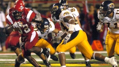 Louisiana Lafayette's Tryell Fenroy(32) gets ready to still arm Kent State's Cedrick Maxwell, right, Saturday Sept. 20, 2008 in college football at Cajun Field in Lafayette, La.