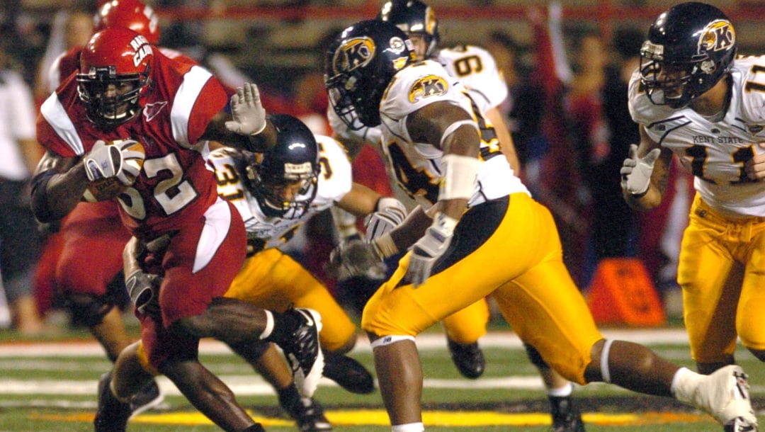 Louisiana Lafayette's Tryell Fenroy(32) gets ready to still arm Kent State's Cedrick Maxwell, right, Saturday Sept. 20, 2008 in college football at Cajun Field in Lafayette, La.