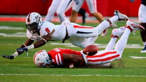 Nebraska wide receiver Stanley Morgan Jr. (8) can't reach the ball while being defended by South Alabama cornerback Jeremy Reaves (9) during the first half of an NCAA college football game in Lincoln, Neb., Saturday, Sept. 12, 2015.