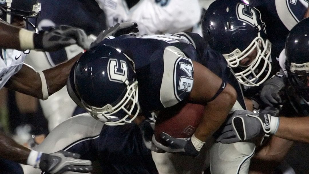 Connecticut running back Donald Brown forces his way up the field for a gain in the first half of the Connecticut-Maine football game in East Hartford, Conn., Saturday, Sept. 8, 2007. UConn defeated Maine 38-0 with Brown picking up a total 107 yards.