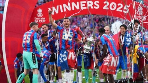 Crystal Palace players celebrate with the trophy after winning the English FA Cup final soccer match between Crystal Palace and Manchester City at Wembley stadium in London, Saturday, May 17, 2025.